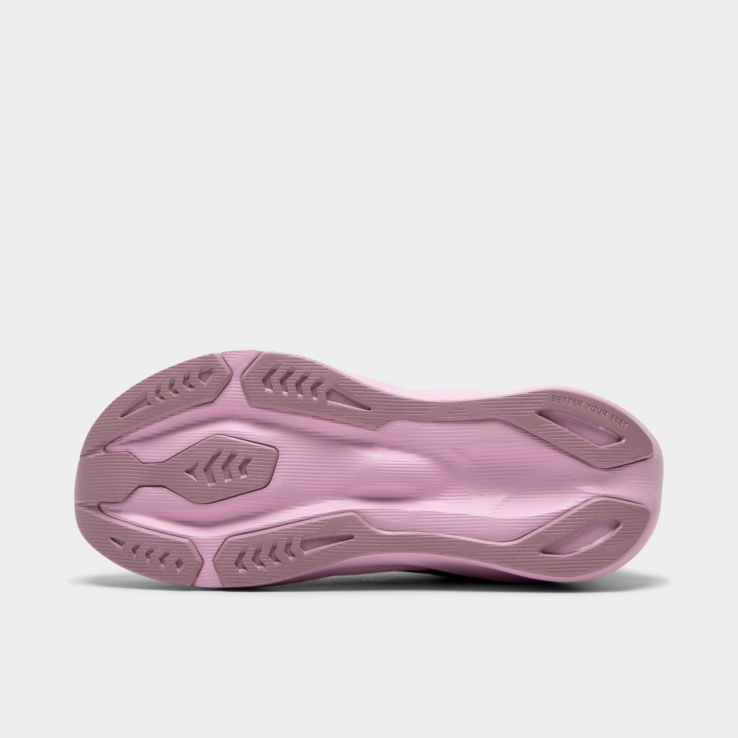 ASICS Juniors' Novablast 5. Bottom view of hazy lilac and dark prune junior running shoe showing lilac and dark prune segmented outsole with textured tread pattern.