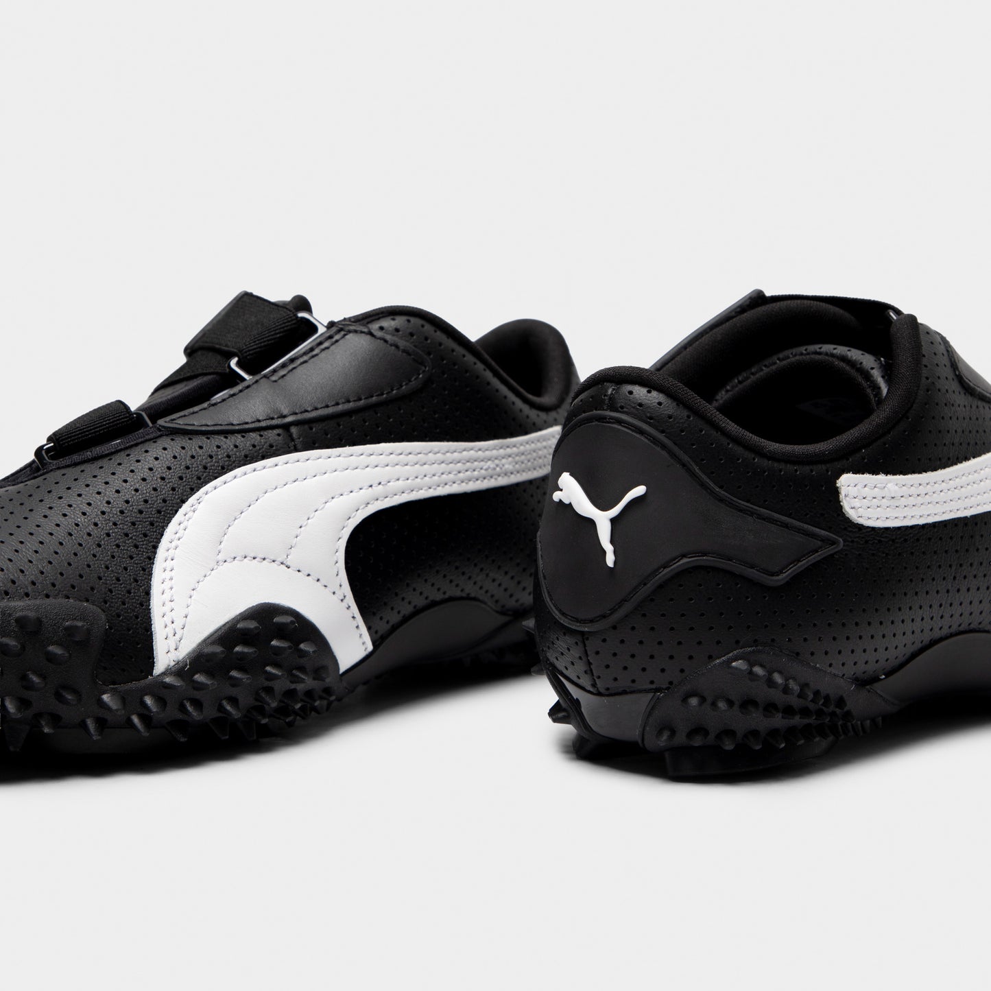 PUMA Women's Mostro Perf Black / White