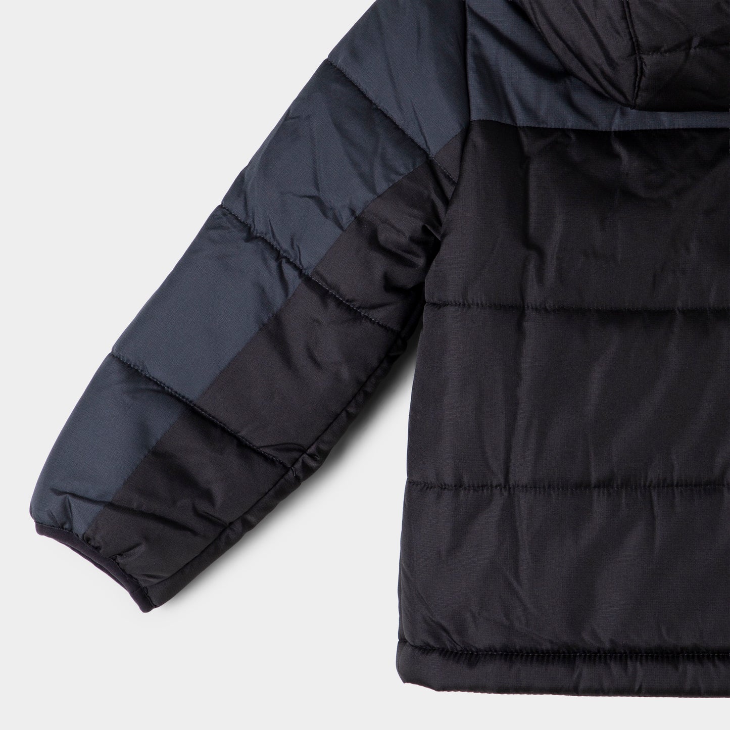 Nike Enfant Veste matelassée couleur block et Cloisonnée / Noir