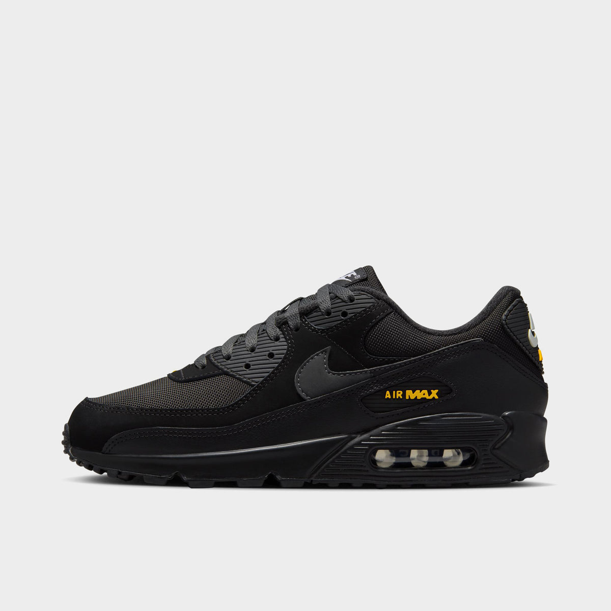 Black nike with gold best sale