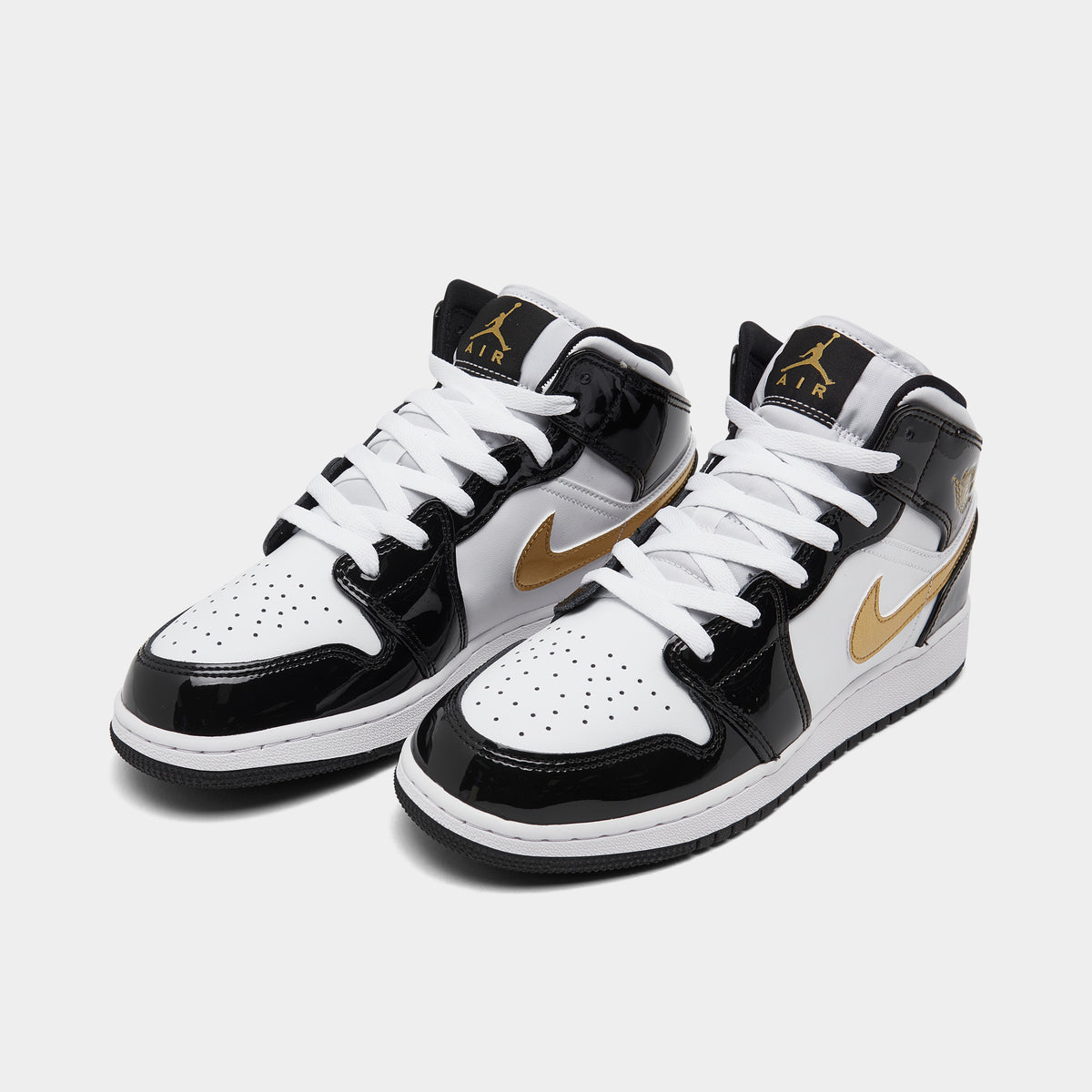 Jordans black and on sale white and gold