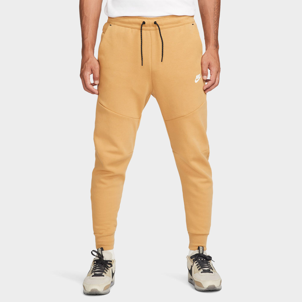 Gold nike joggers discount