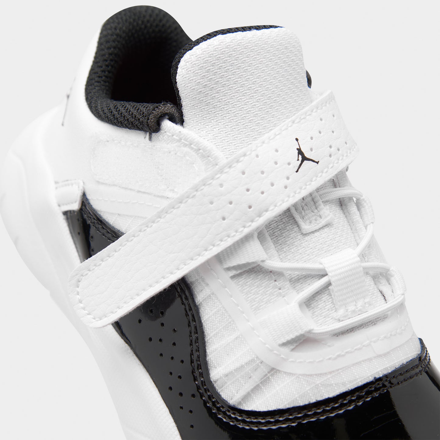 Jordan 11 CMFT Low TD White / Black - University Red