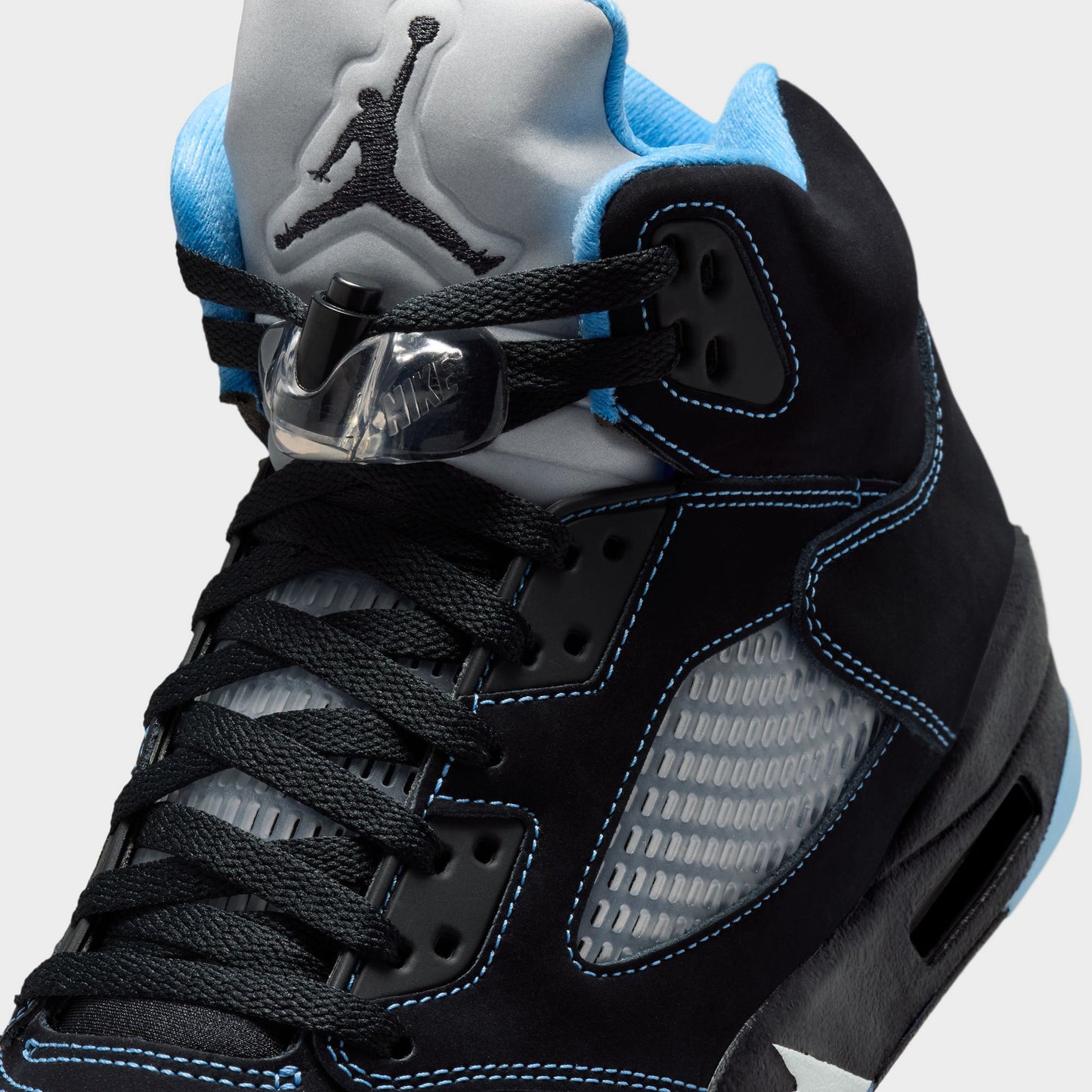 Jordan 5 Rétro Noir / Bleu Universitaire - Blanc