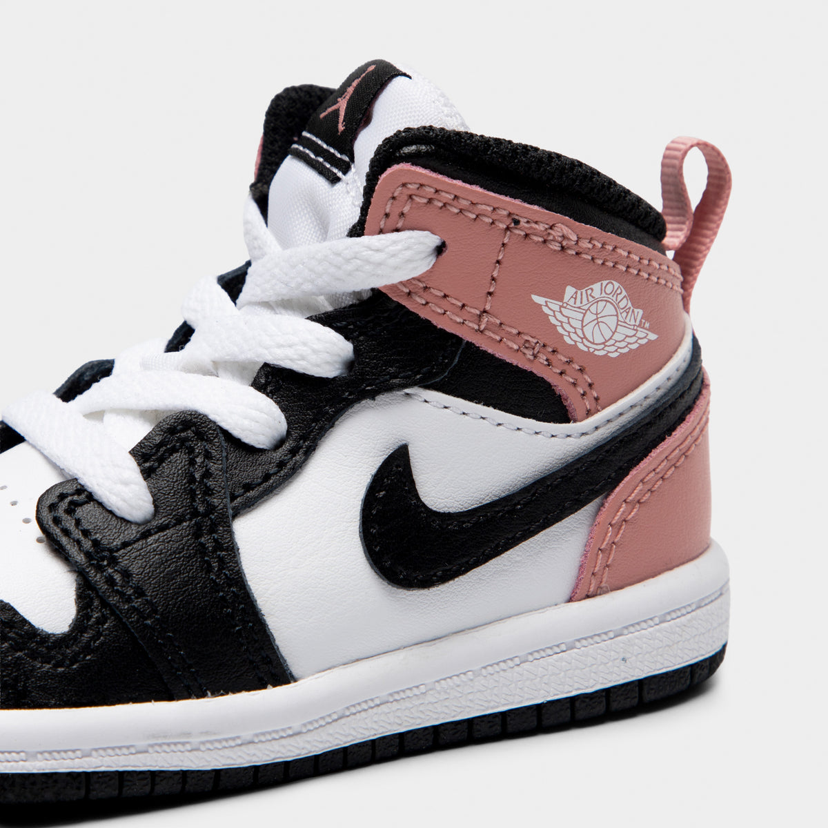 Jordan 1 Mid TD Blanc / Noir - Rose Rouille