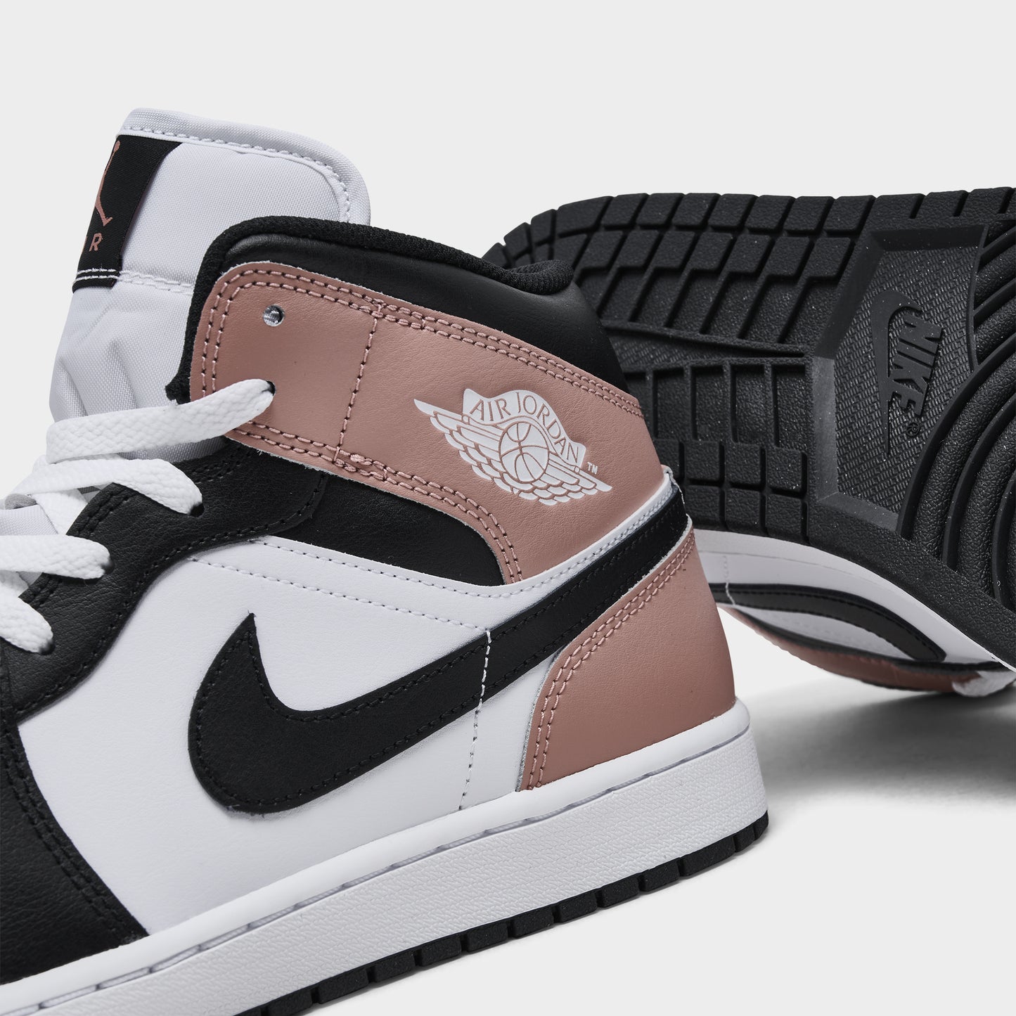 Jordan 1 Mid White / Black - Rust Pink