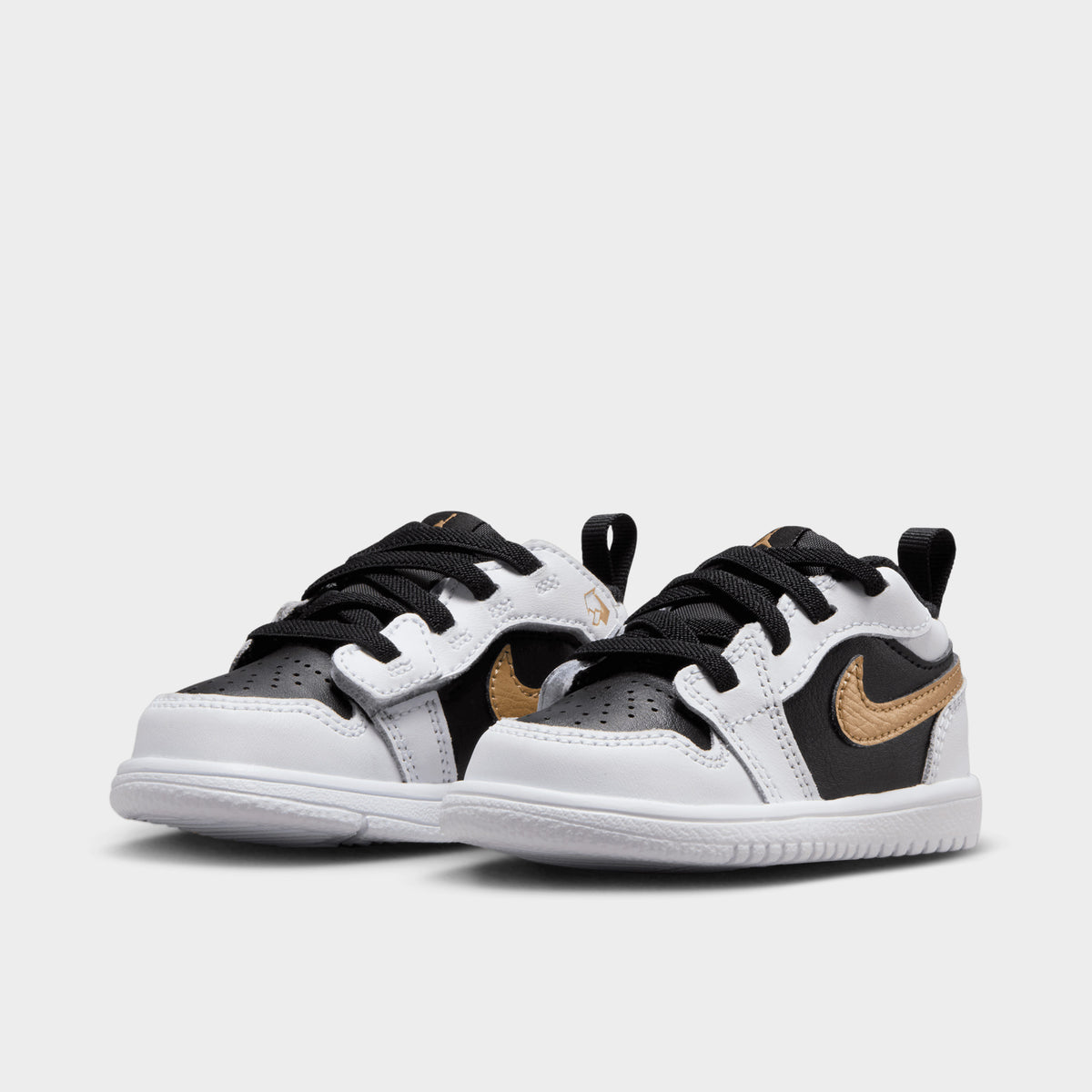 Gold jordan 1 low hotsell