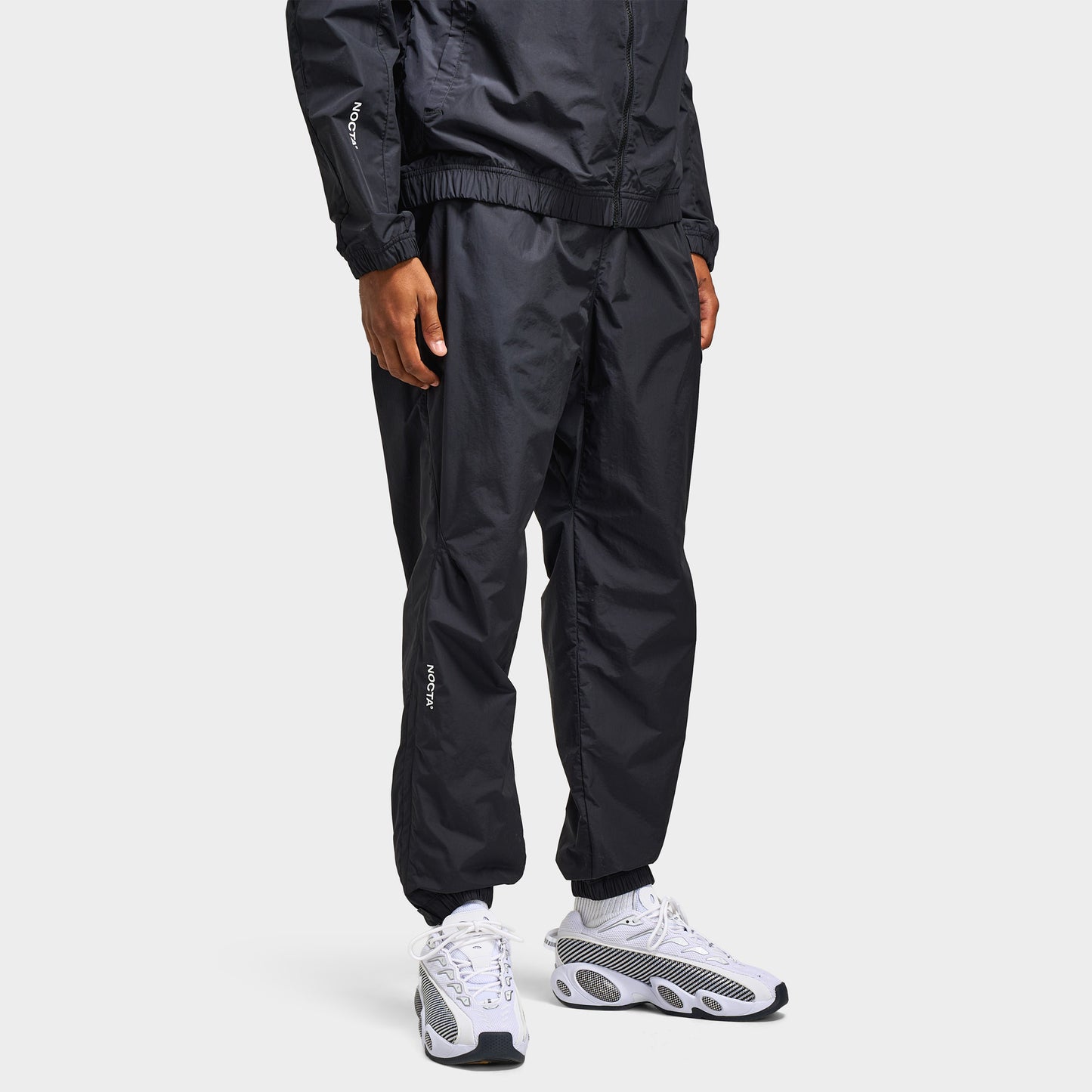 Nike Nocta Cardinal Woven Track Pants Black / White
