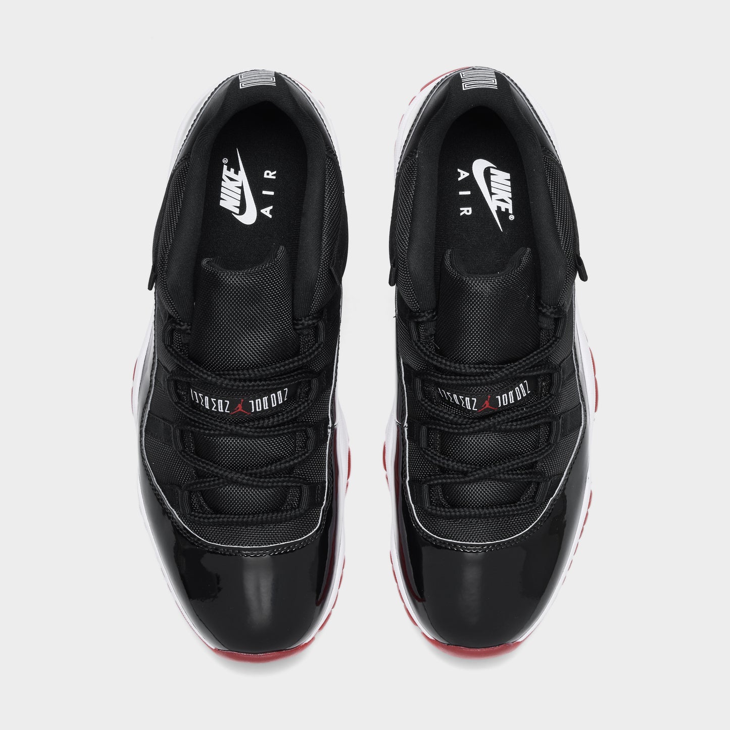 Jordan 11 Retro Low Black / Varsity Red - White