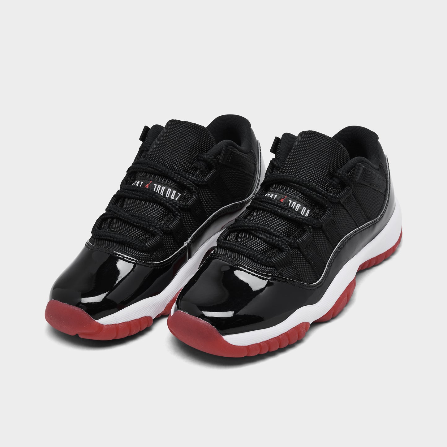 Jordan 11 Retro Low GS Black / Varsity Red - White
