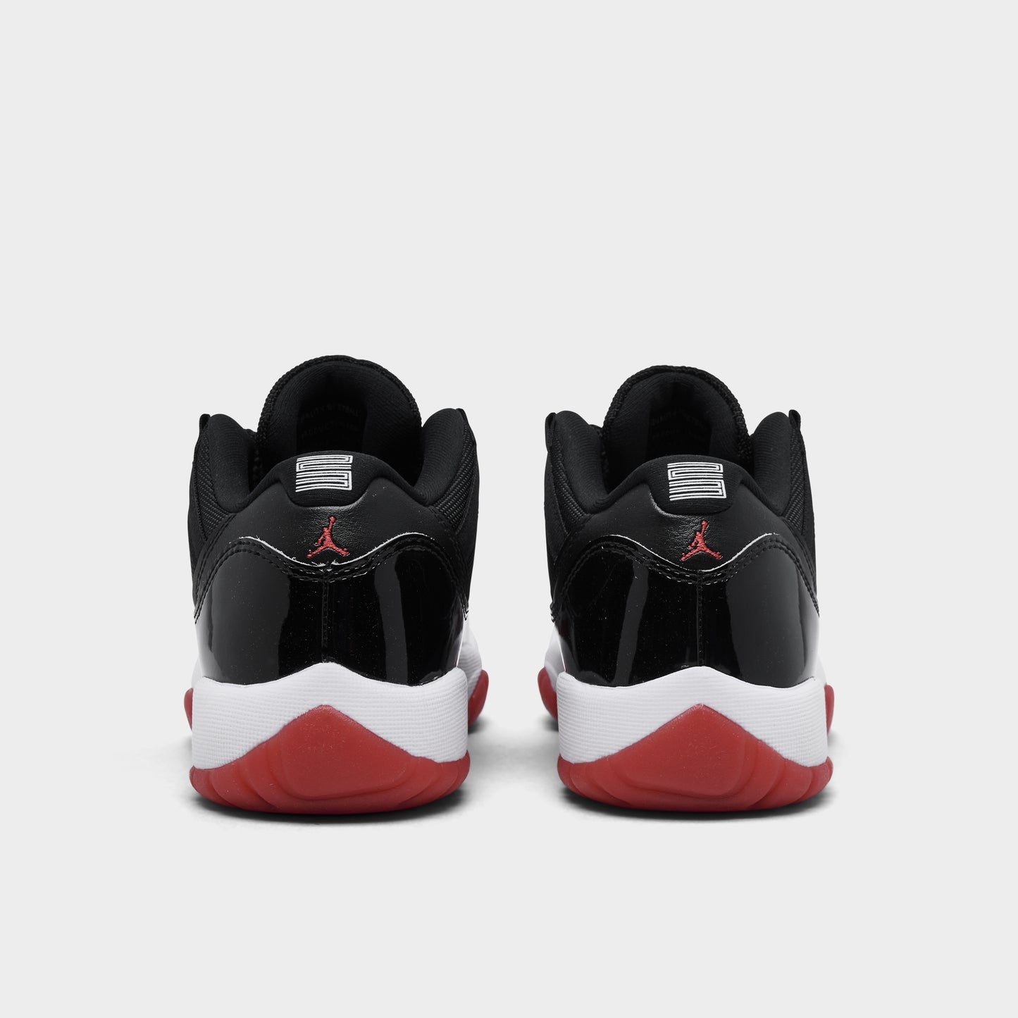 Jordan 11 Retro Low GS Black / Varsity Red - White