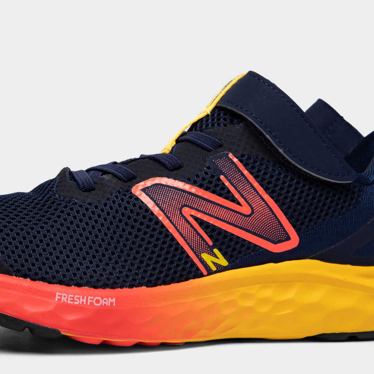 New Balance Juniors Fresh Foam Arishi v4 Team Navy Electric Red
