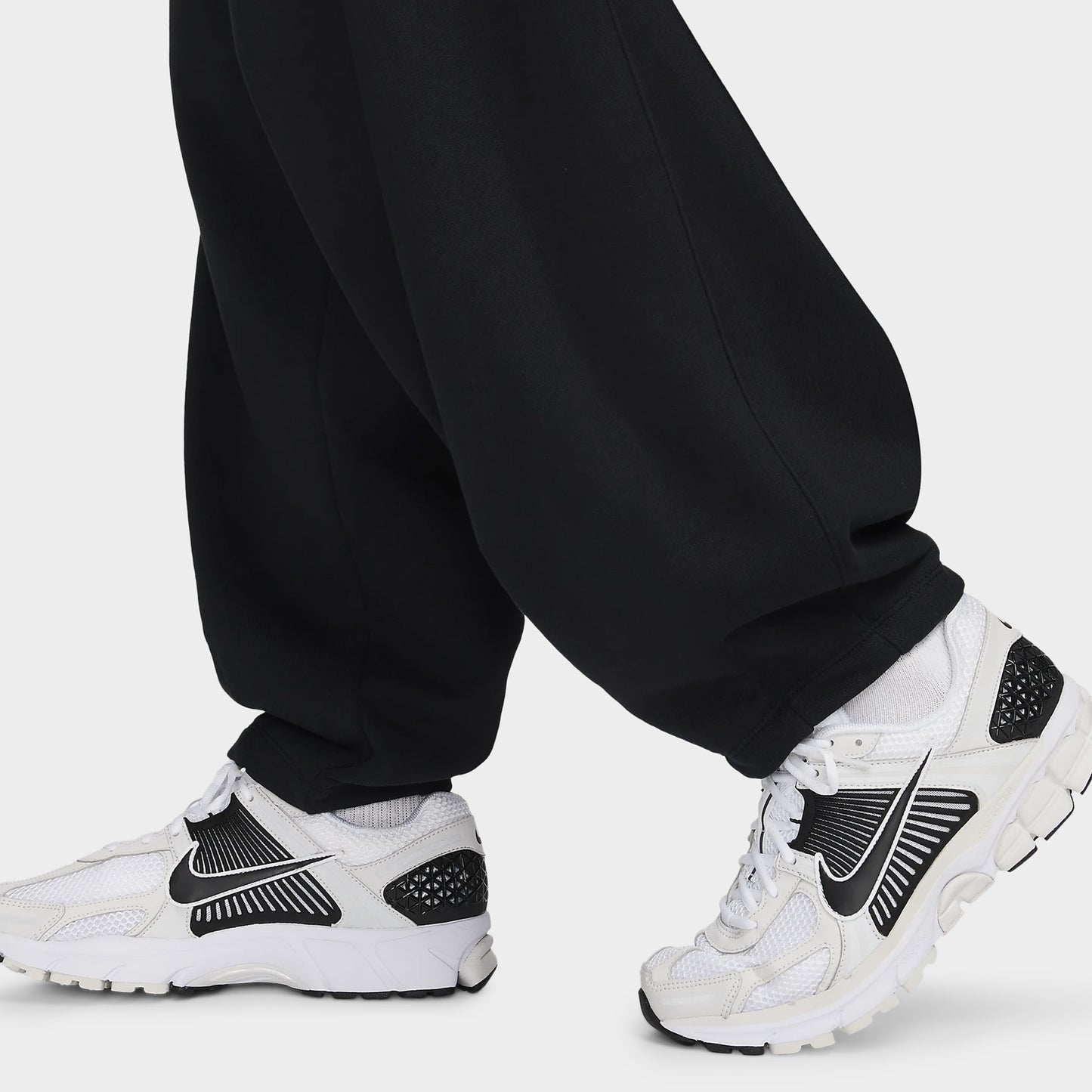 Nike Sportswear Club Pantalon surdimensionné en polaire Noir / Blanc