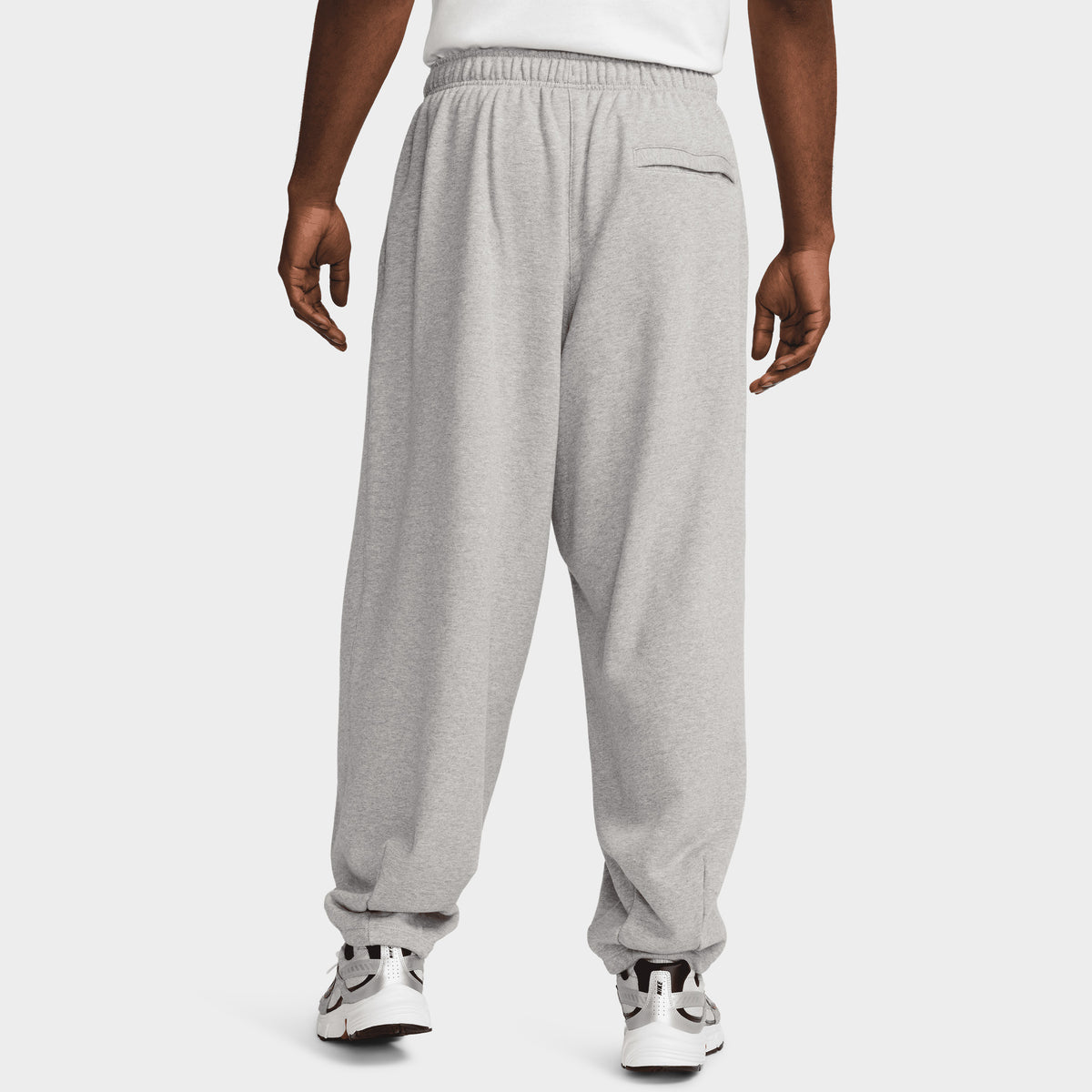 Nike sportswear fleece pants discount