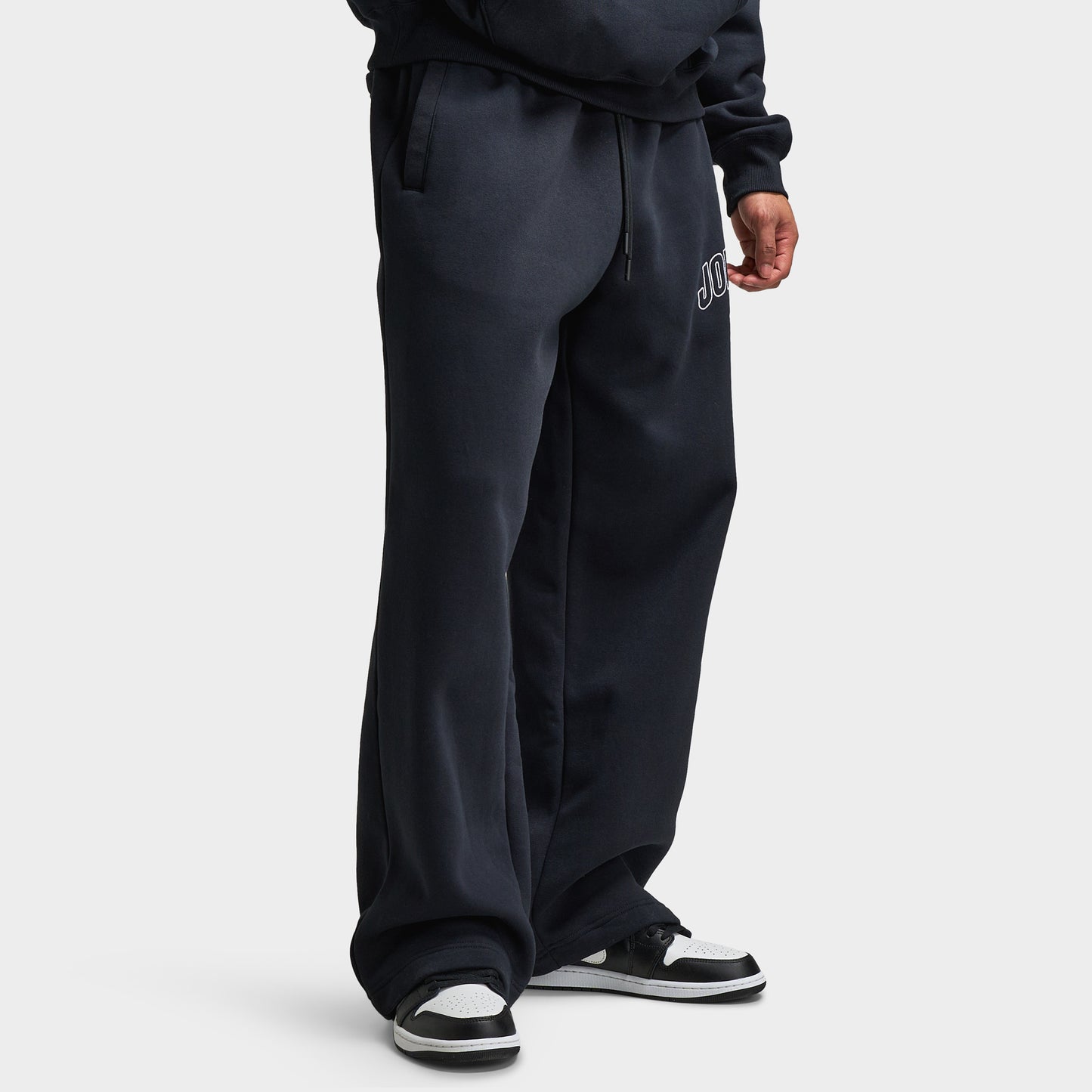 Jordan Brooklyn Pantalon graphique surdimensionné Noir / rouge foncé