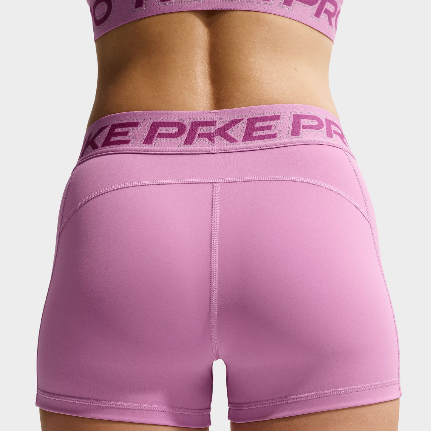 Nike Pro 365 Short taille mi-haute 7,6 cm Femmes Magenta clair/pêche glacée