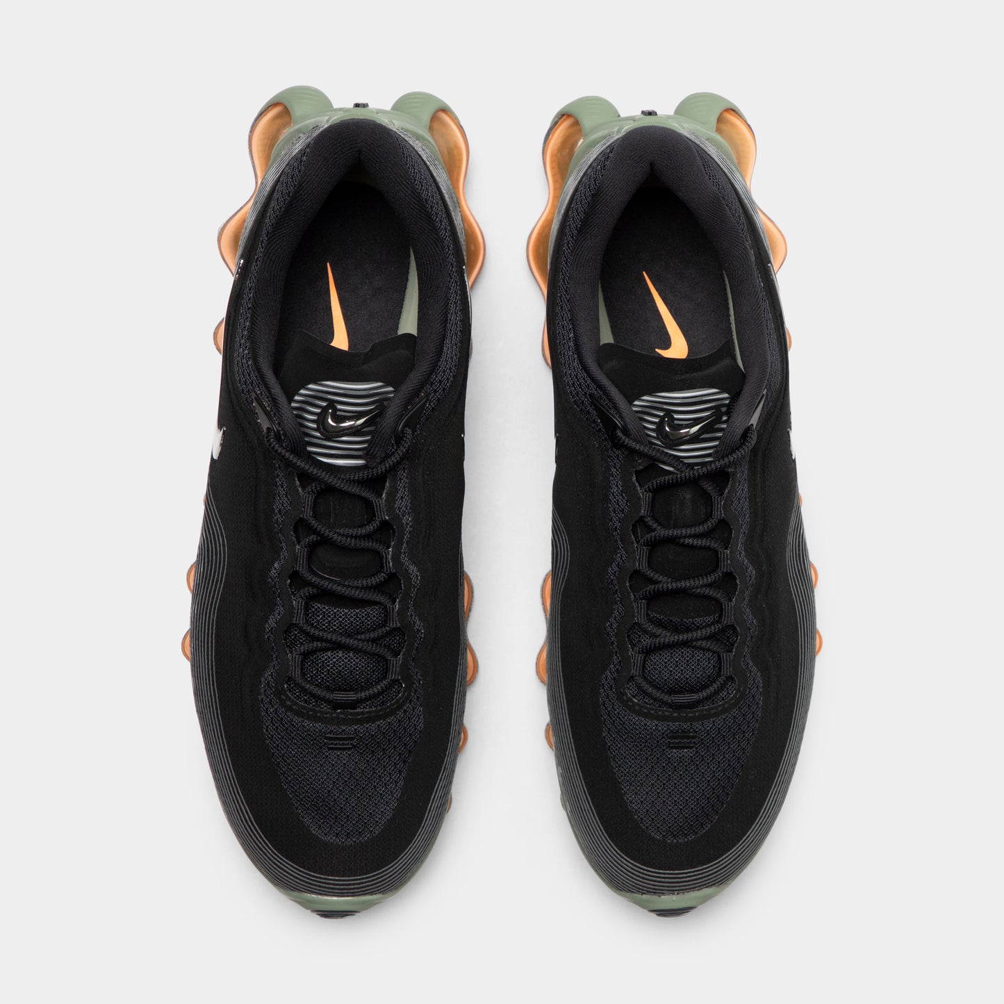 Nike Air Liquid Max. Top view of black, metallic silver and light army sneakers showing black laces, padded tongues and light army heel accents.