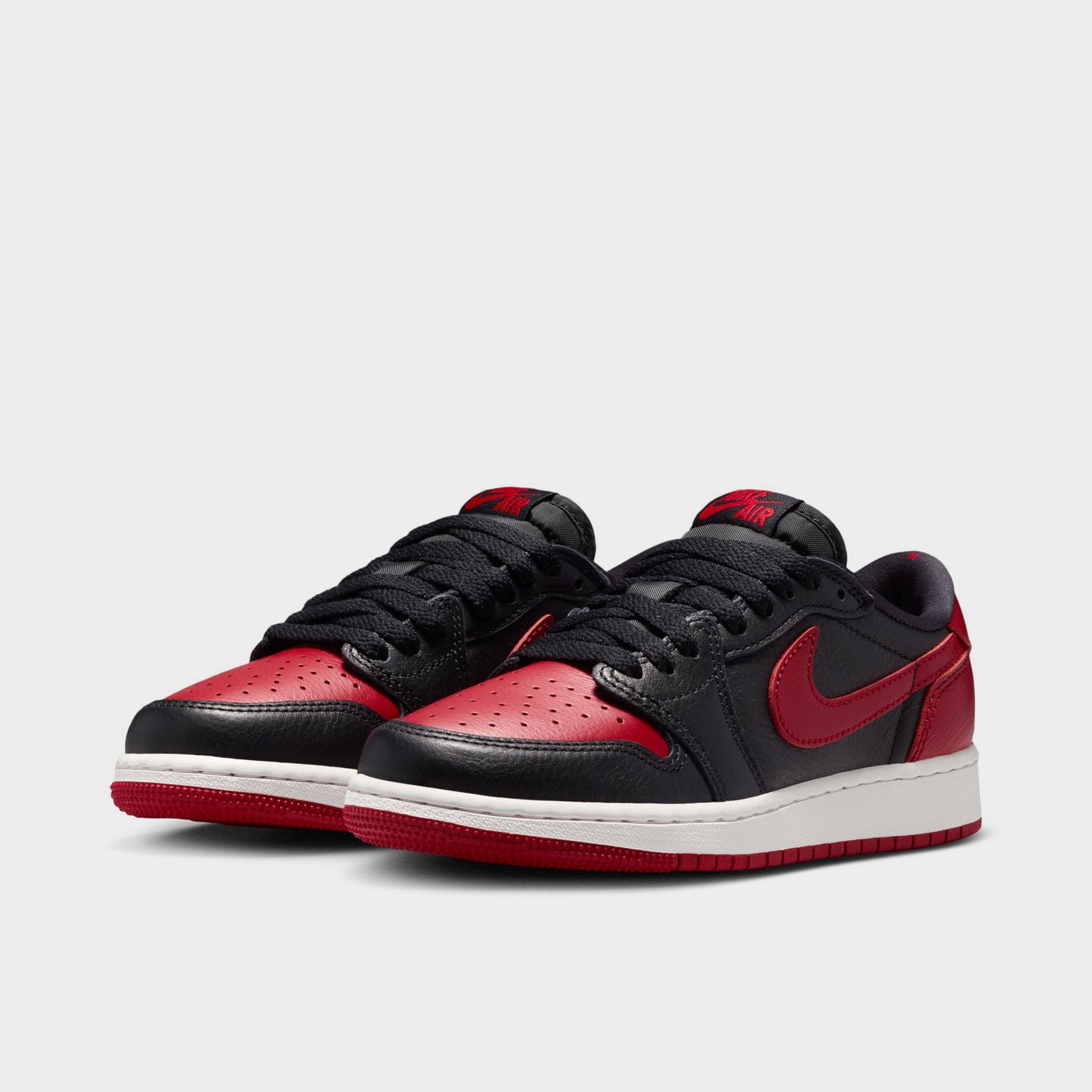 Jordan 1 Low OG Retro GS Noir / Noir - Rouge Varsity