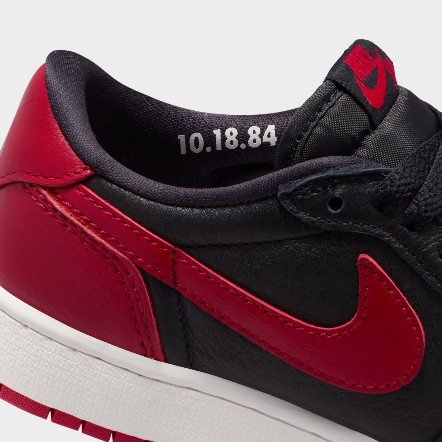 Jordan 1 Low OG Retro GS Noir / Noir - Rouge Varsity
