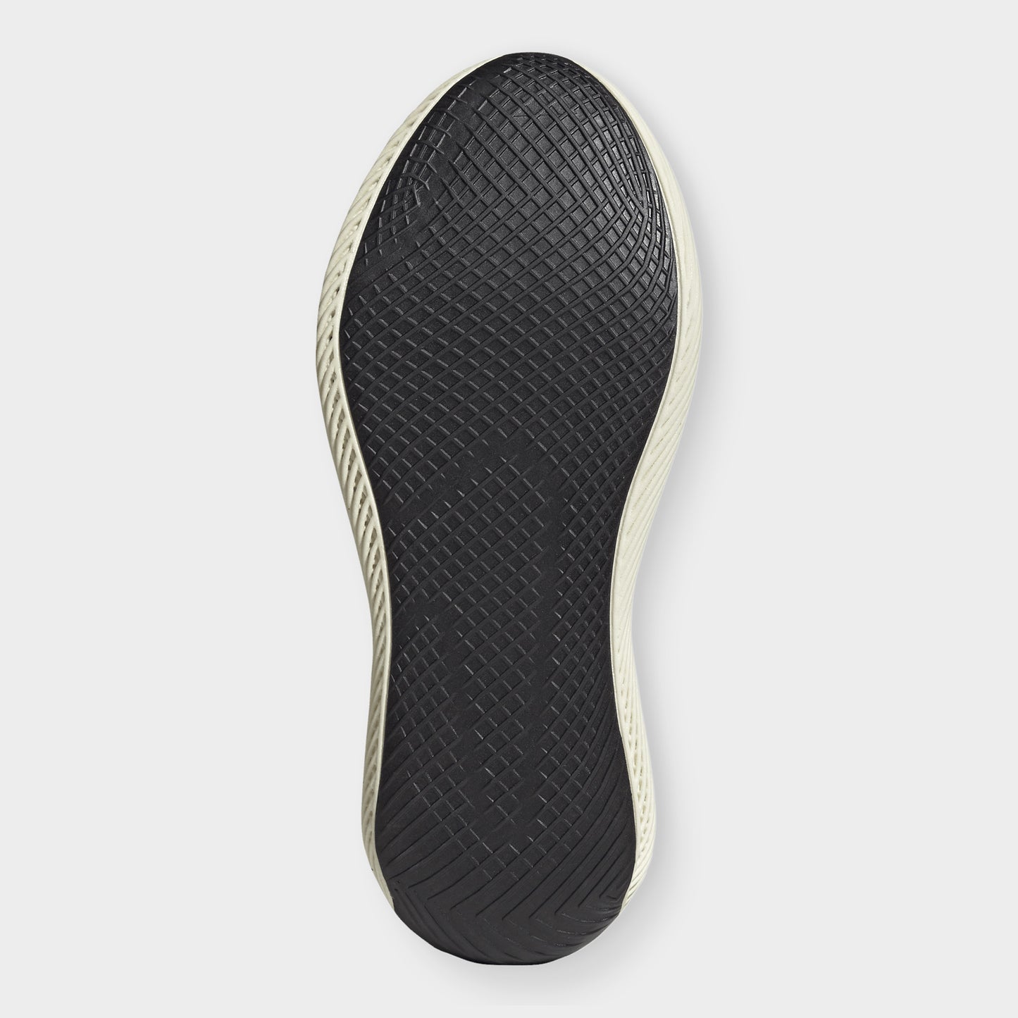 adidas Climacool Laced. Bottom view of off white and black sneaker showing black outsole with smooth central tread and rounded heel.