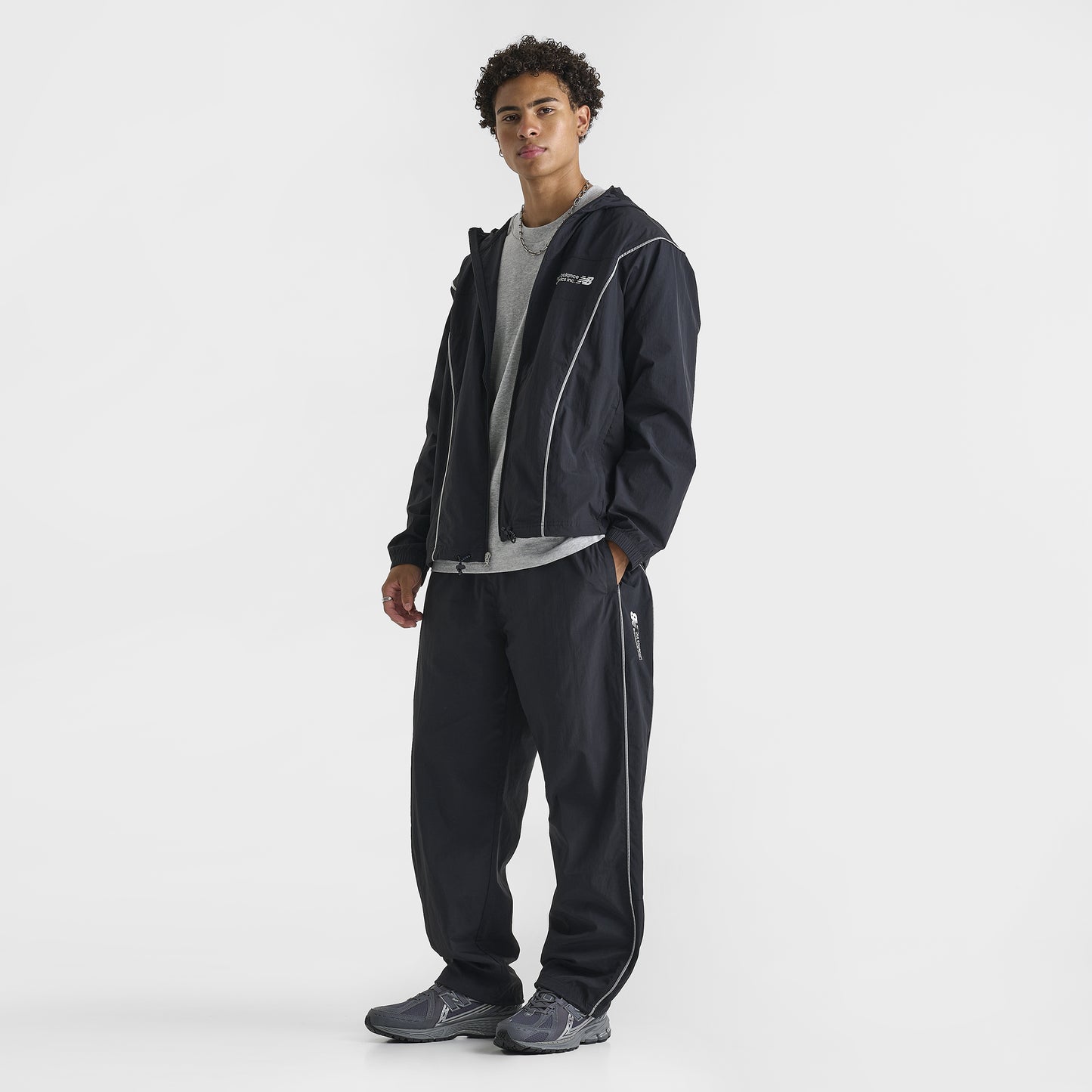 New Balance Vision Woven Track Pants Black / 3M Reflective