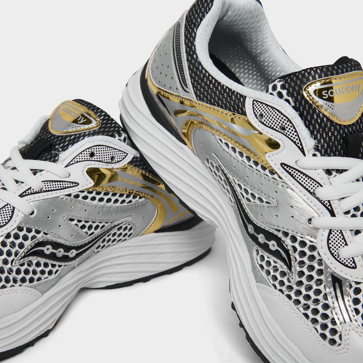 Saucony Juniors' Omni 9 White / Gold - Silver