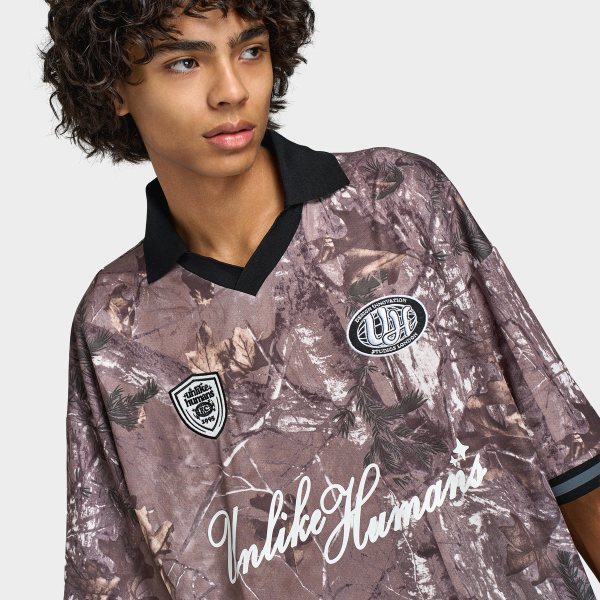 Unlike Humans Savis Football Tee / Woodland
