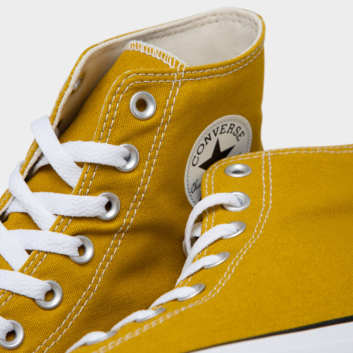 Dark store yellow converse