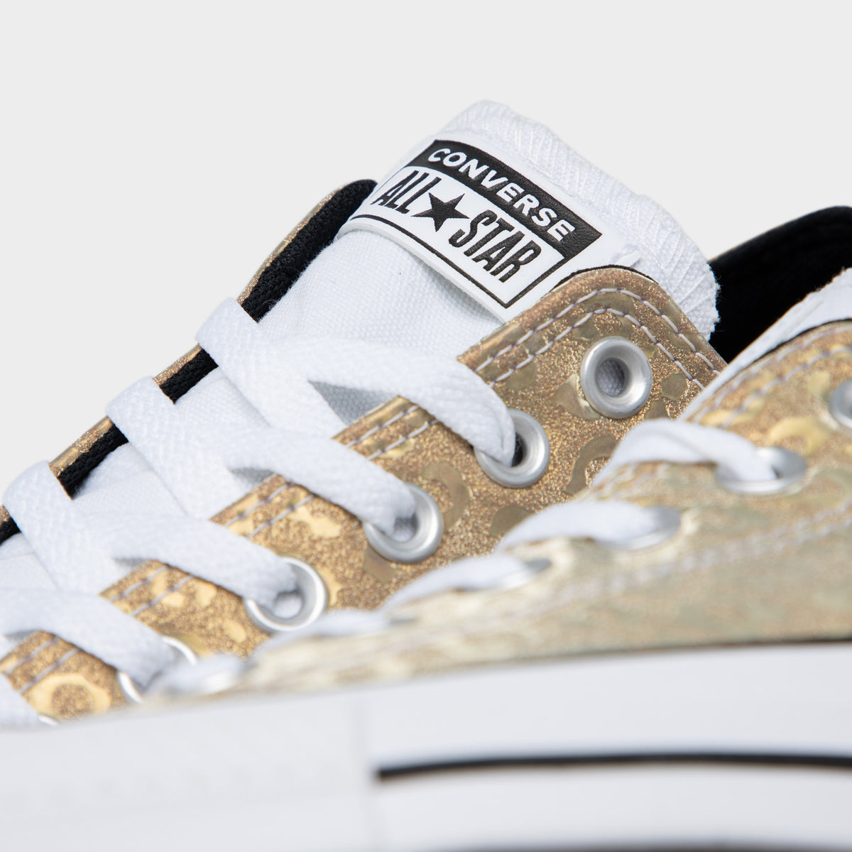 Converse Women s Chuck Taylor All Star Leopard Glitter Saturn Gold