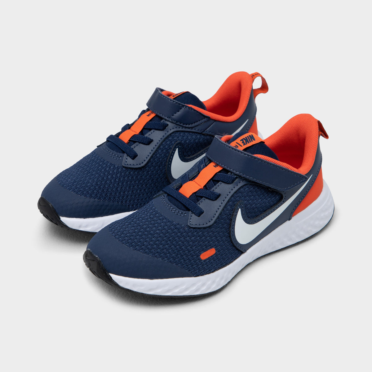 Kids blue and hotsell orange nike revolution