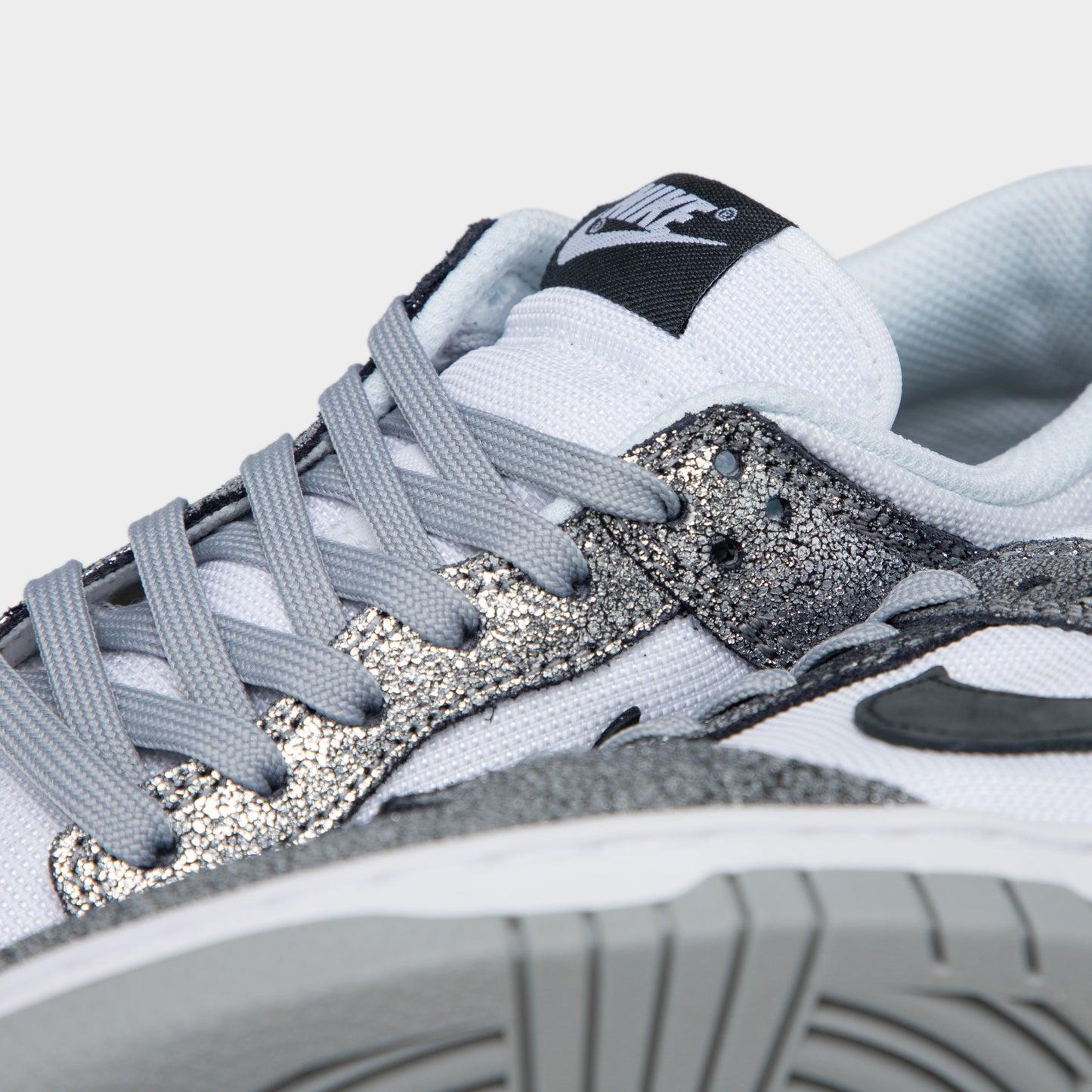 Nike Women's Dunk Low Metallic Silver / Off Noir - White