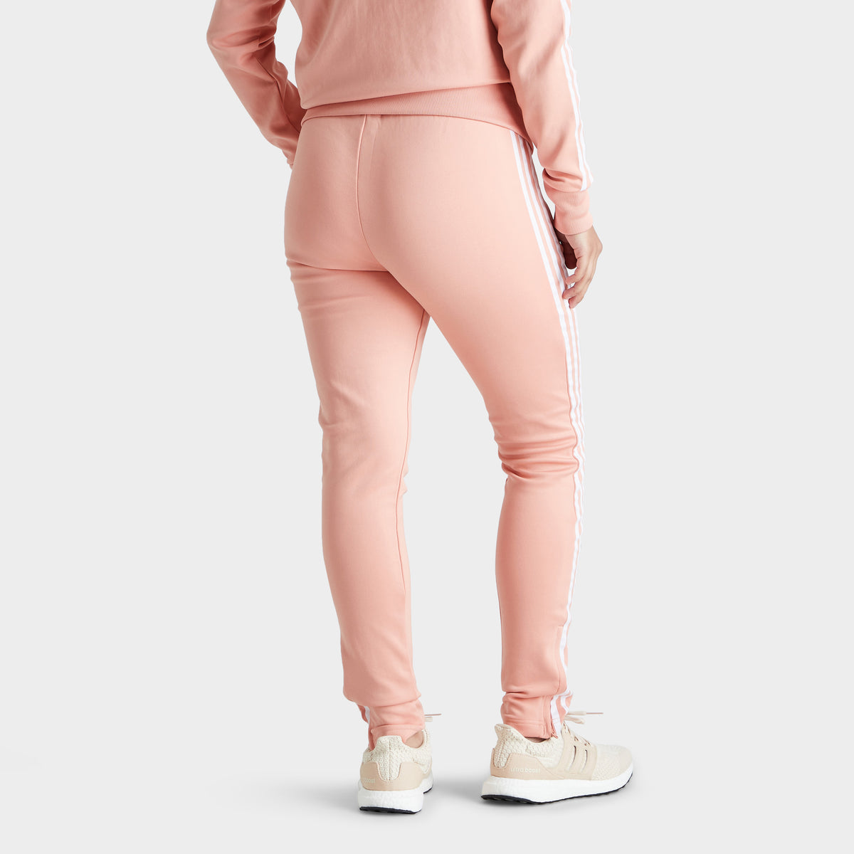 adidas Originals Women s Primeblue SST Track Pants Ambient Blush