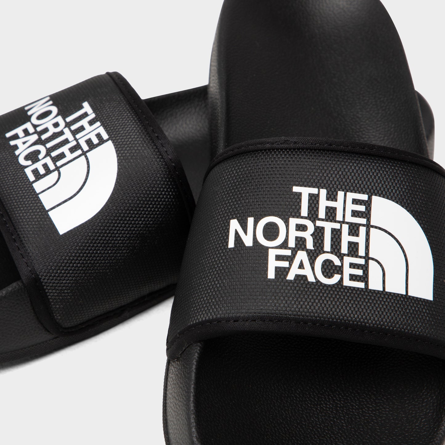 The North Face Claquettes Base Camp III Femme Noir TNF / Blanc TNF