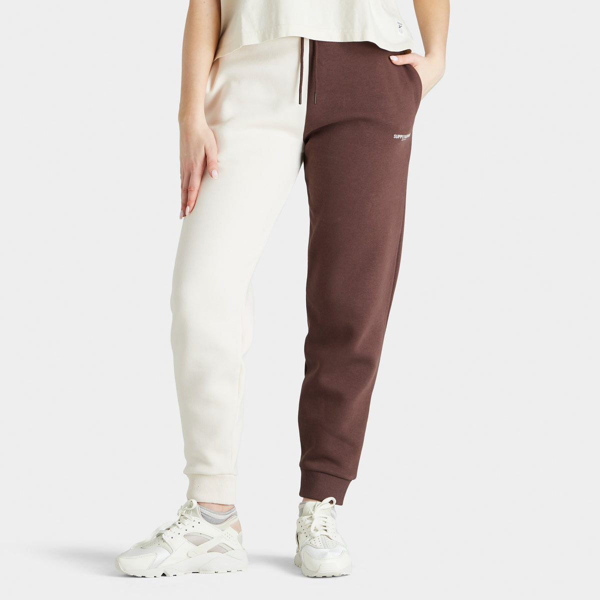 Nike metallic swoosh colour block joggers in neutrals sales