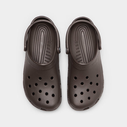 Crocs Classic Clog. Top view of espresso clogs showing ventilation holes, rounded toe boxes and pivoting heel straps.