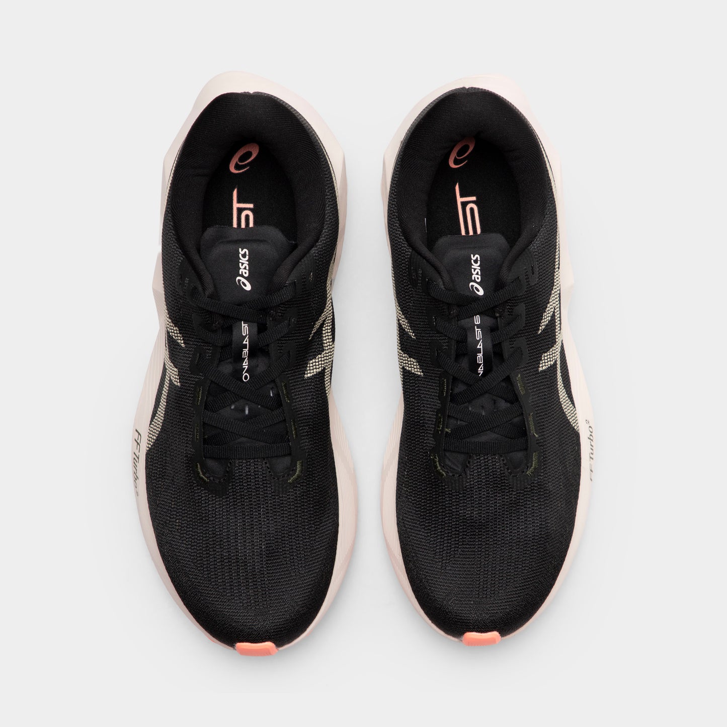 ASICS Novablast 6. Top view of black and khaki running shoes showing black laces, padded tongues and orange insole details.