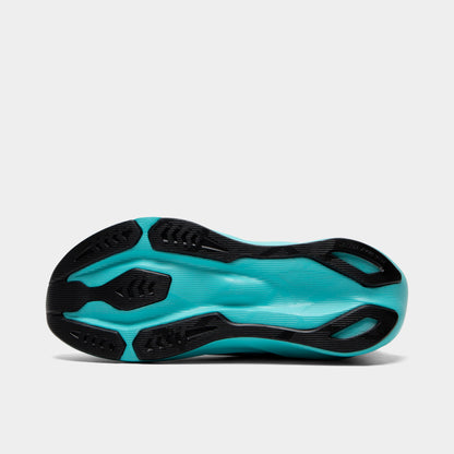 ASICS Juniors' Novablast 5. Bottom view of ice mint and black junior running shoe showing black and ice mint segmented outsole with textured tread pattern.