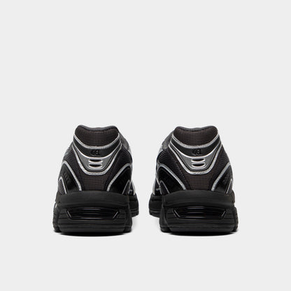 ASICS Gel-Stratus MC. Rear view of graphite grey and black sneakers with padded heel panels and black soles.
