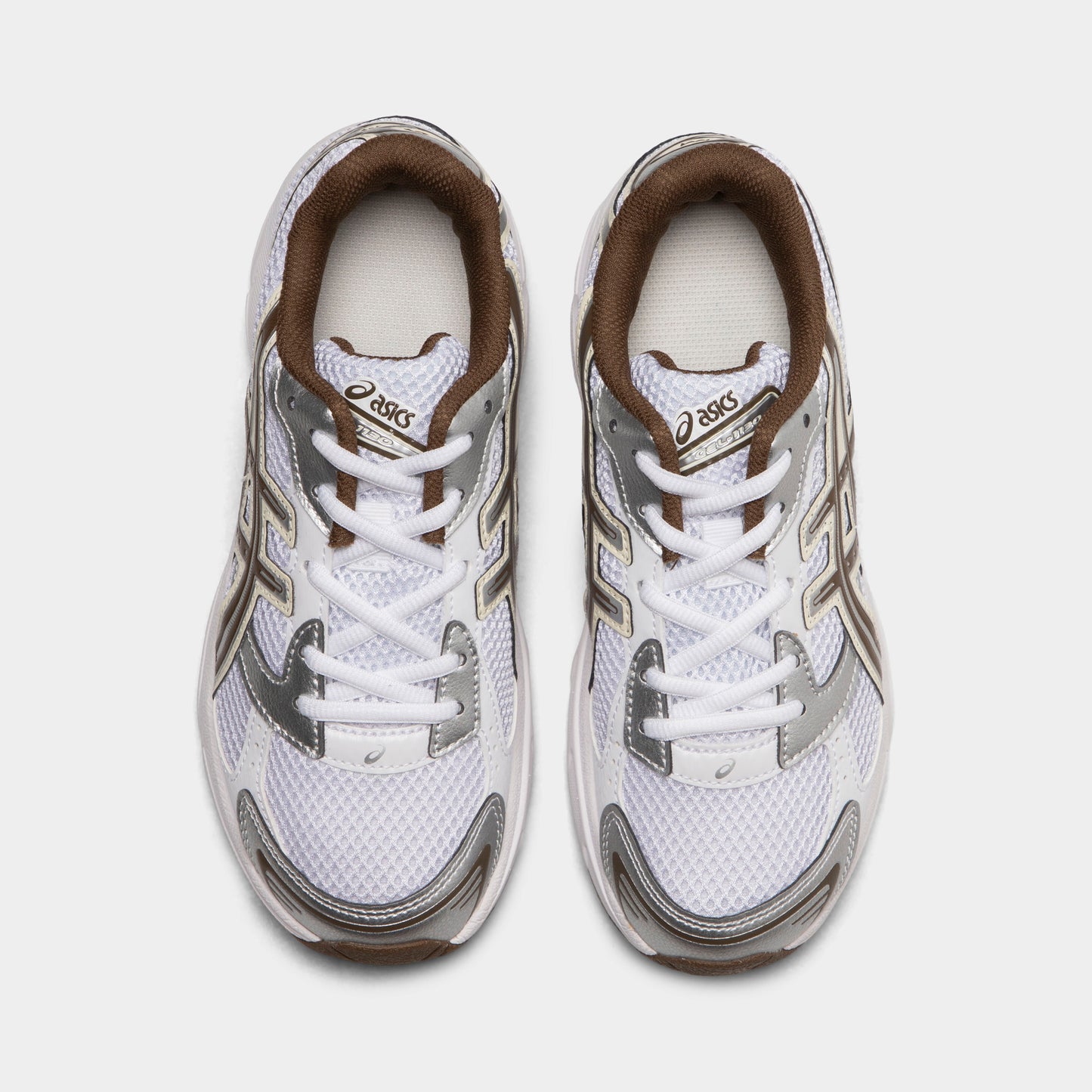 ASICS GEL-1130 GS. Top view of white and clay canyon sneakers showing white laces, padded tongues and mesh toe boxes.