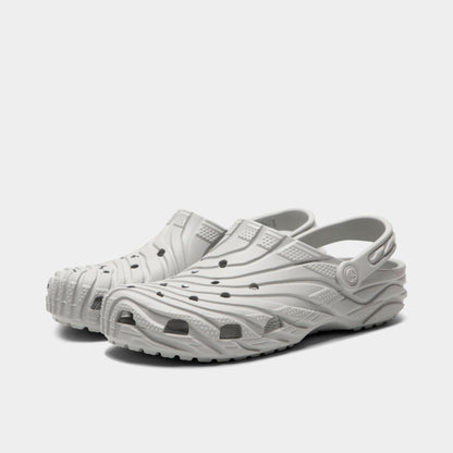 Crocs Classic Erosion Clog. Three-quarter view of atmosphere clogs with sculpted uppers, ventilation holes, raised heel straps and chunky soles.