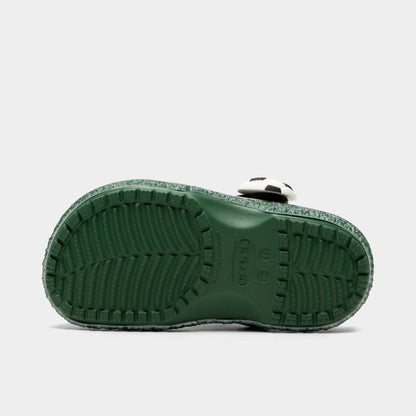 Crocs Kids' Classic Funlab Clog. Bottom view of turf green infant clog showing textured outsole with segmented tread pattern.