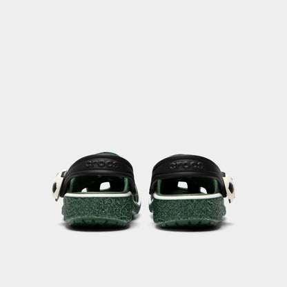 Crocs Kids' Classic Funlab Clog. Rear view of turf green infant clogs with lowered black heel straps and matching green soles.