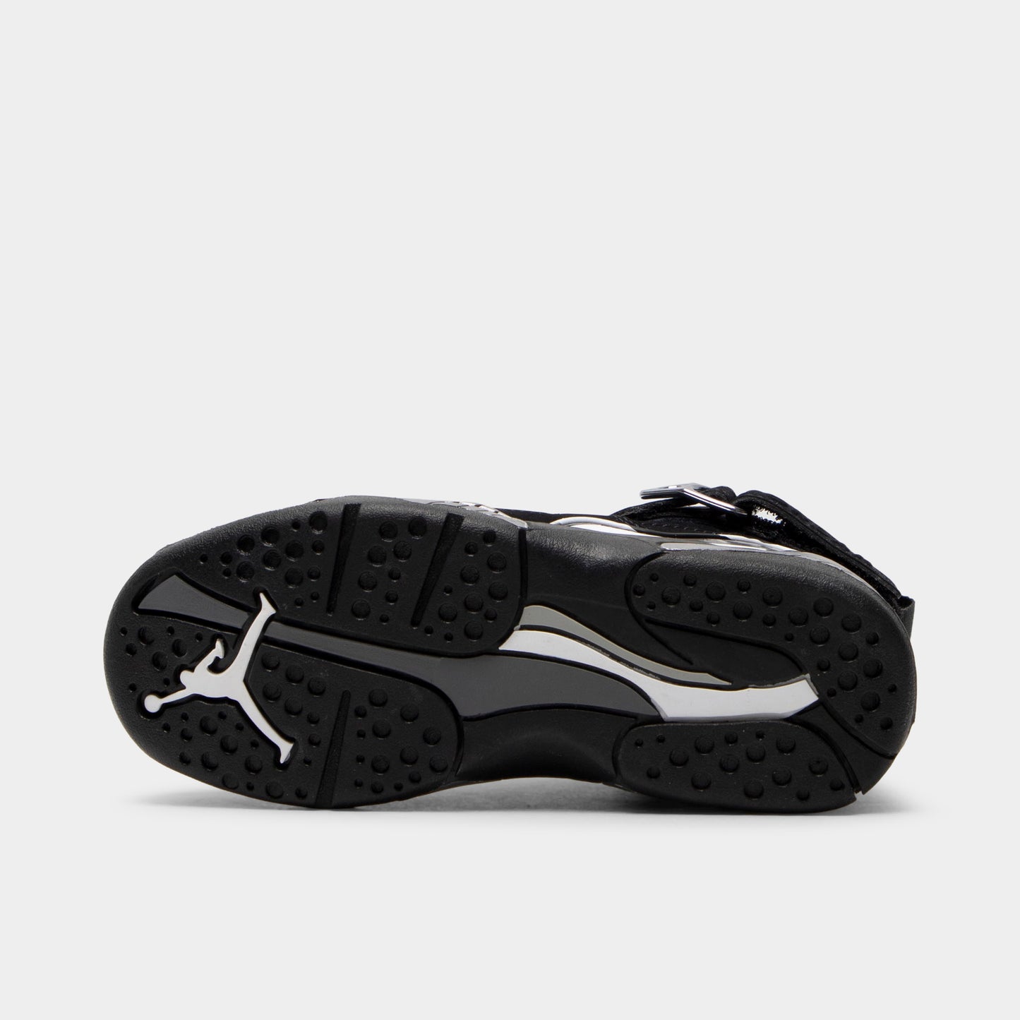 Jordan 8 Retro PS Black / White - Light Graphite. Bottom view of the black sneaker showing the rubber outsole and pivot-circle traction pattern