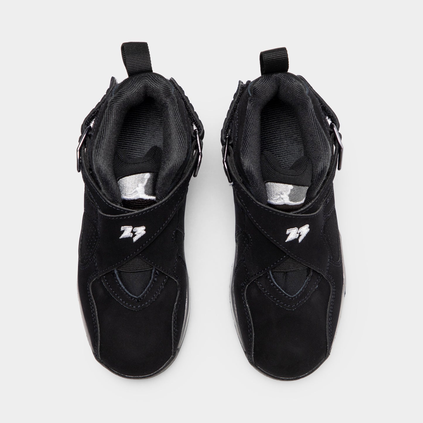 Jordan 8 Retro PS Black / White - Light Graphite. Top view of the pair of black sneakers showing the padded collars and ankle straps