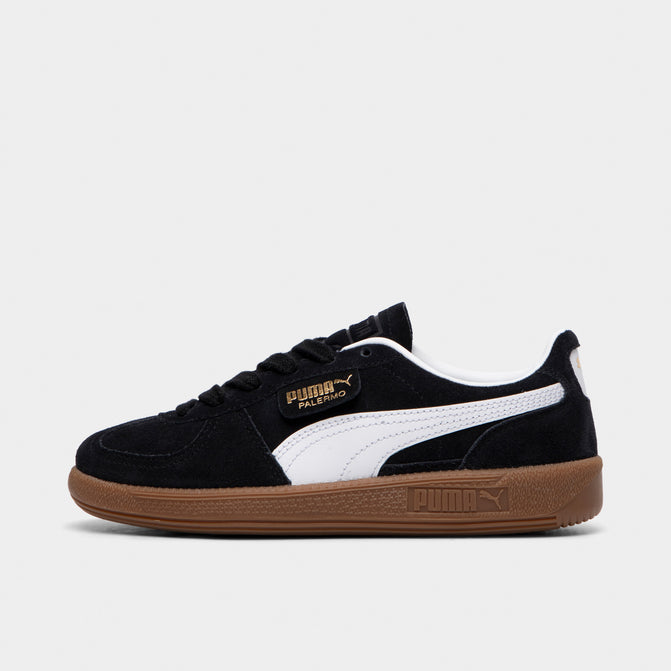 Black puma with brown sole best sale