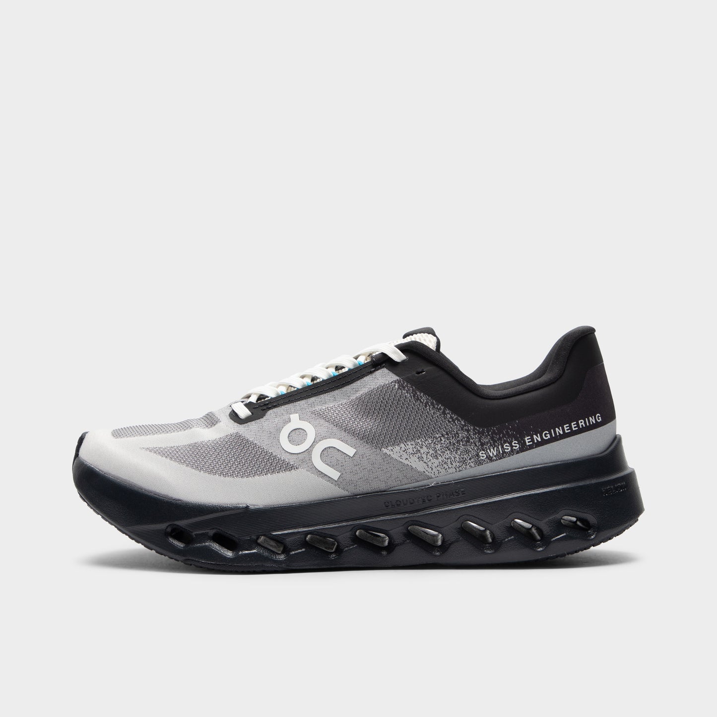 On Cloudsurfer Black / Beige