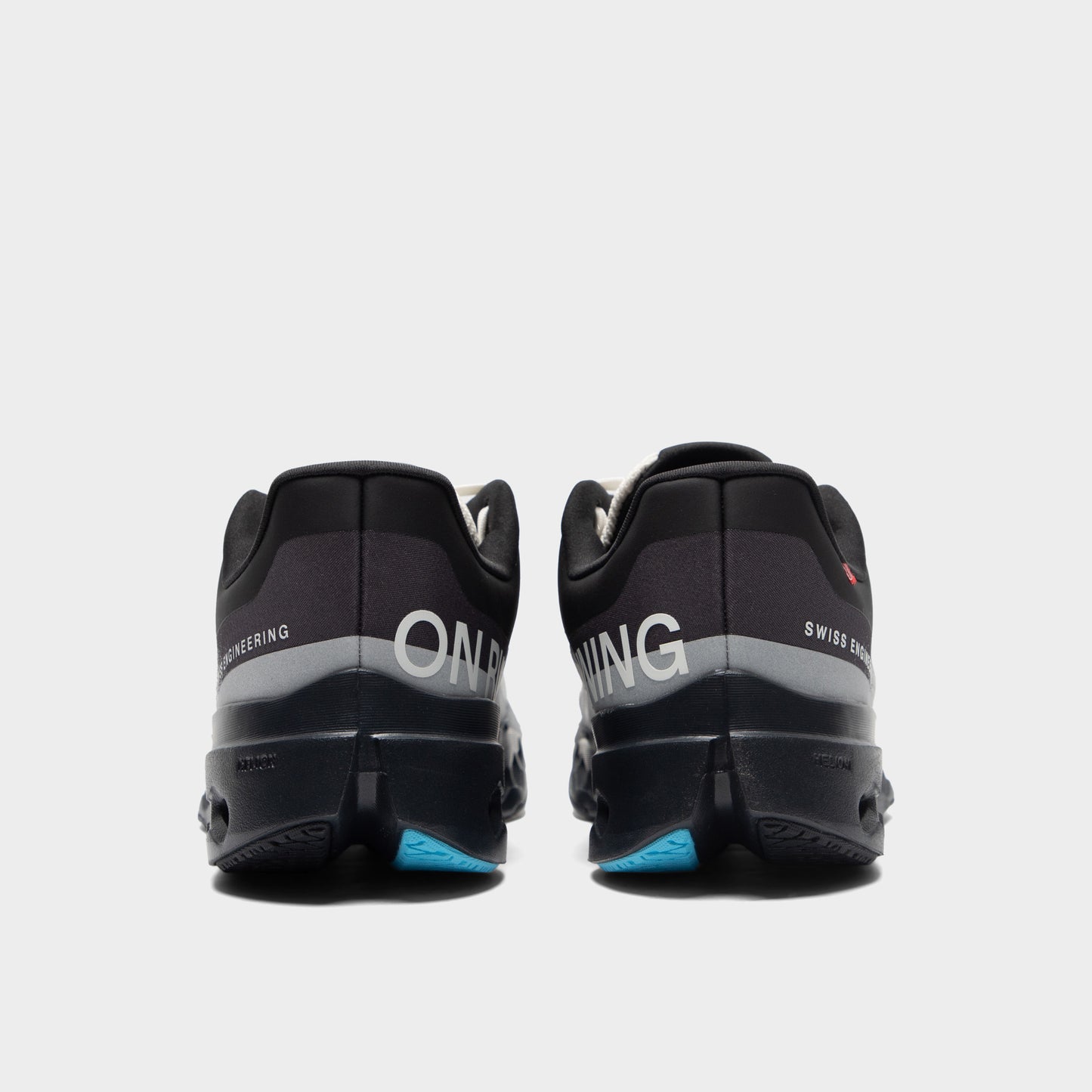 On Cloudsurfer Black / Beige