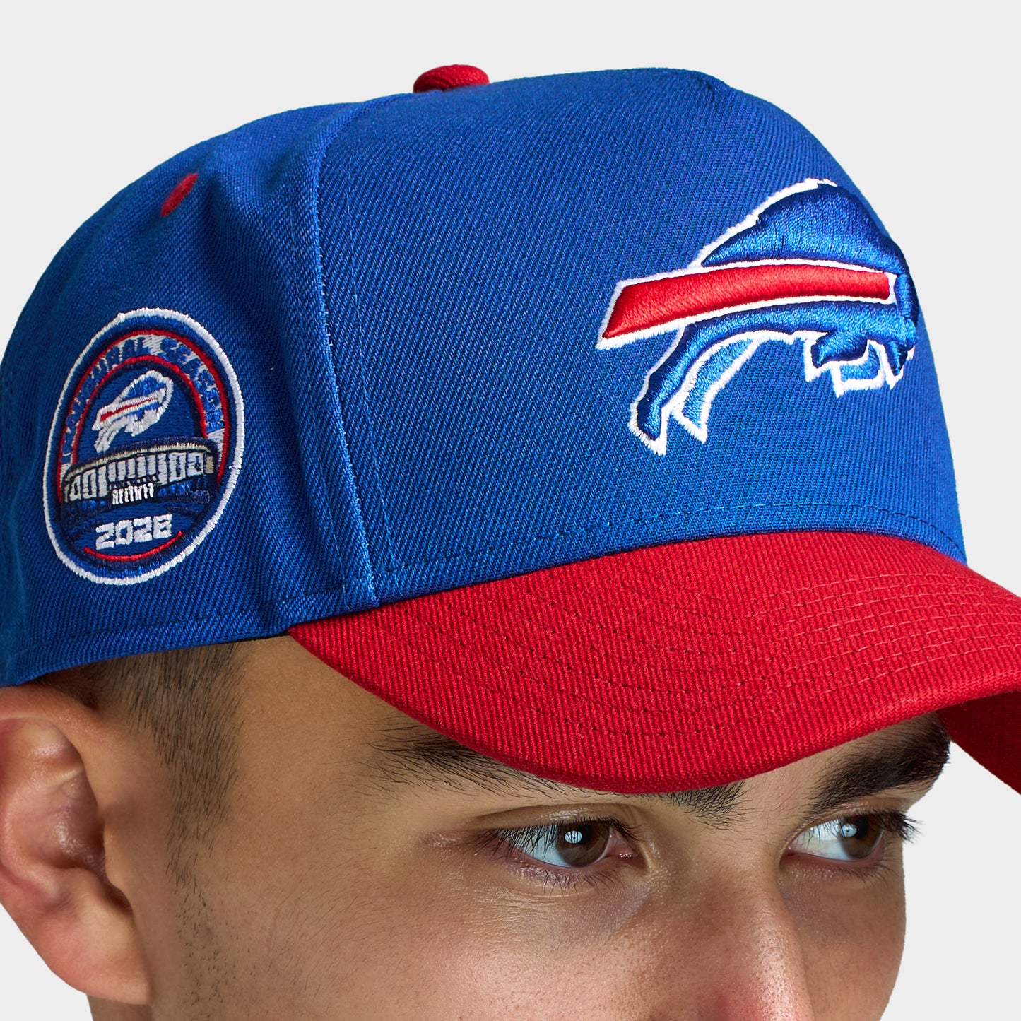 New Era Buffalo Bills 9FORTY AF. Close-up of royal and red cap showing the Buffalo Bills logo, red brim and embroidered side patch.