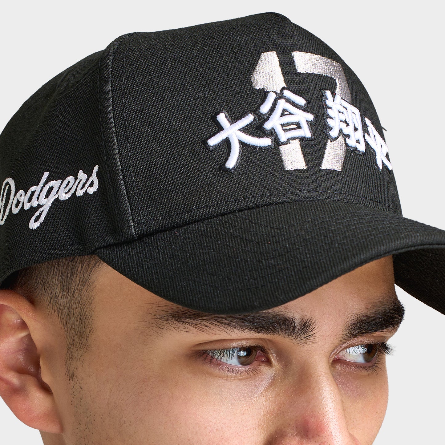 New Era LA Dodgers Shohei 9FORTY AF Snapback. Close-up of black cap showing the white Shohei-inspired front graphic, curved brim and embroidered side script.
