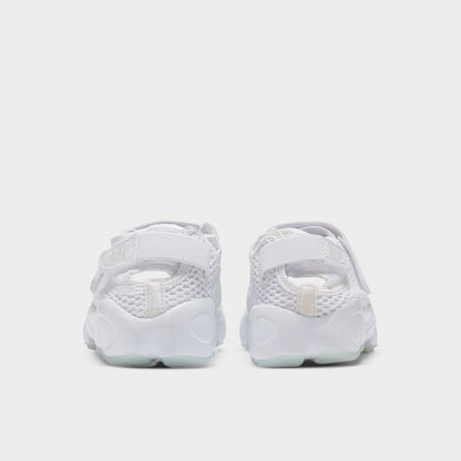 Nike Women's Air Rift Breathe. Rear view of white split-toe sneakers with adjustable heel straps and rounded soles.